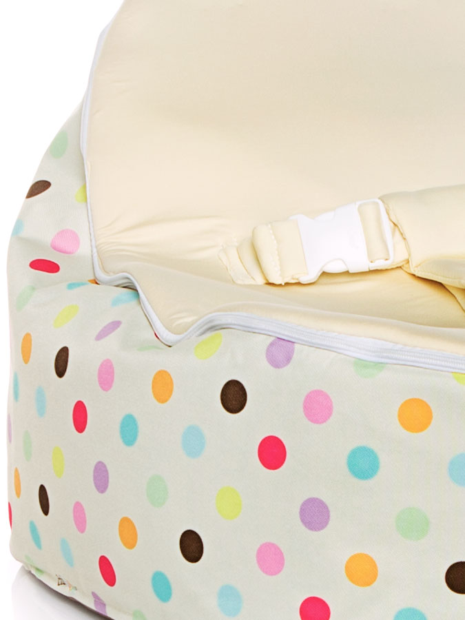 Close up of Sprinkles snuggle pod baby bean bag with swappable cream seat